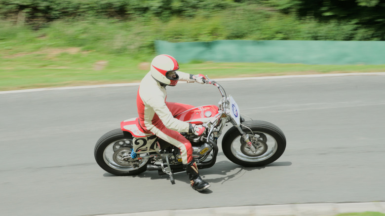 Taking a curve on a vintage twin motorcycle