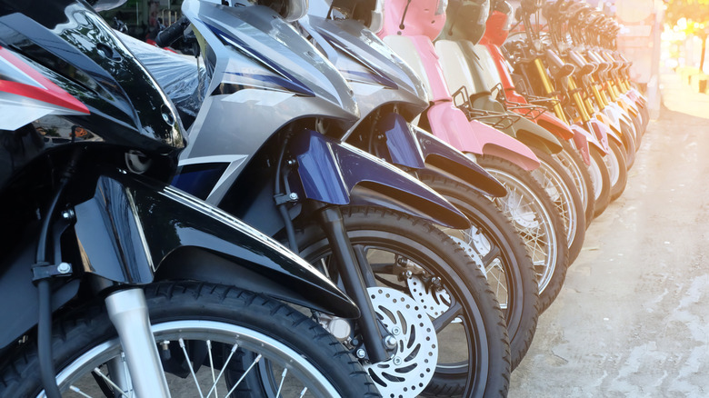 Motorcycles in a row at sale lot