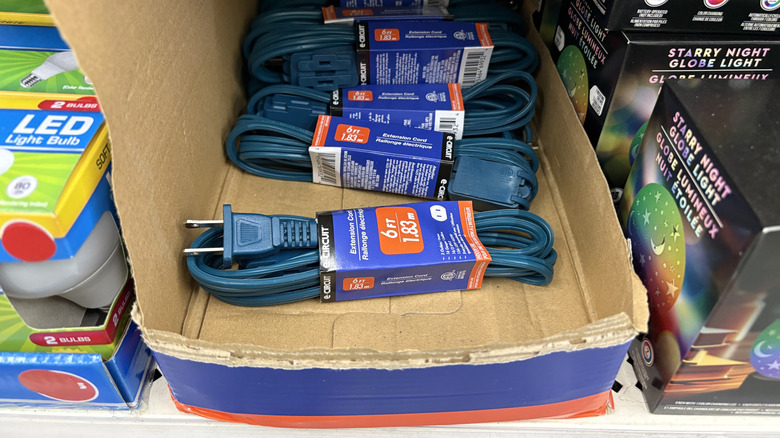 Store display of a box of blue extension cords