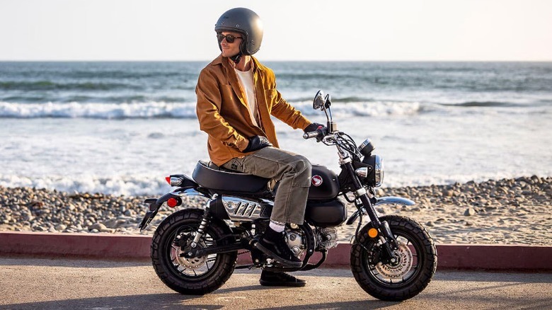 Rider on Honda MiniMOTO at beach