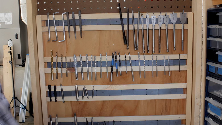several magnetic bit racks on wall