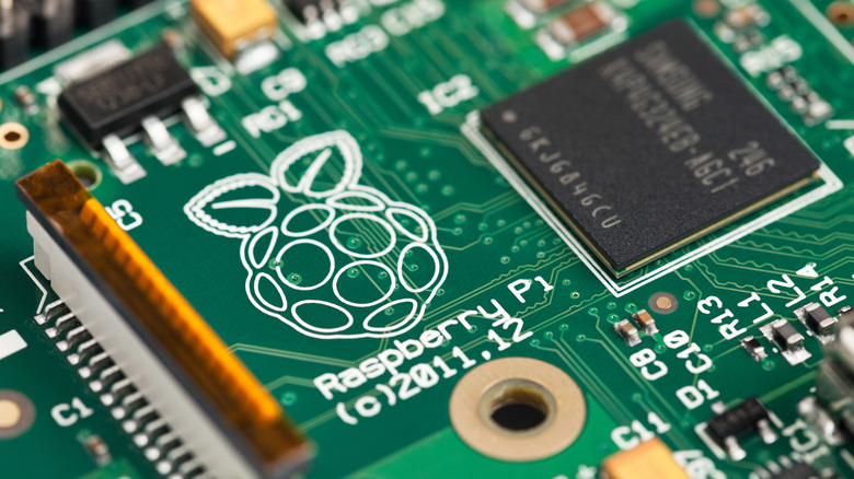 The Raspberry Pi logo on a Raspberry Pi 1.