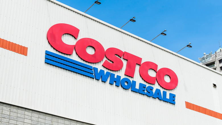 The front of a Costco Wholesale showing the sign.