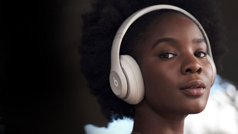 Model wearing the Beats Studio Pro Wireless Headphones