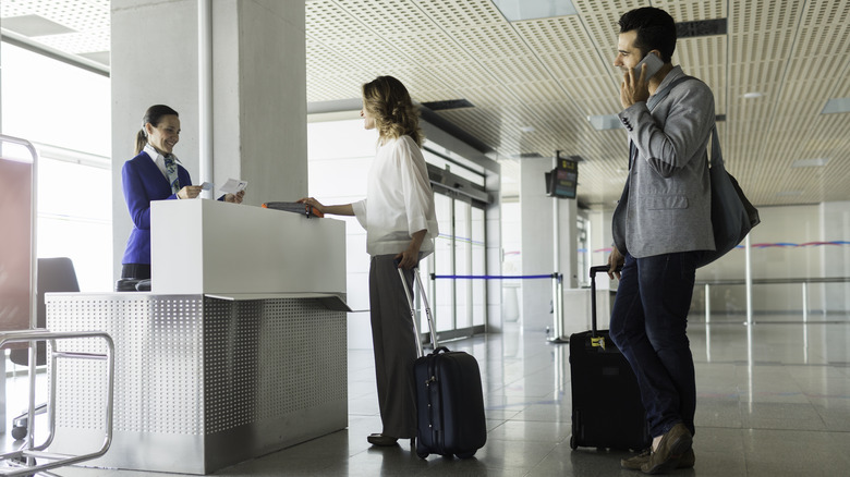 people at airline gate in airport