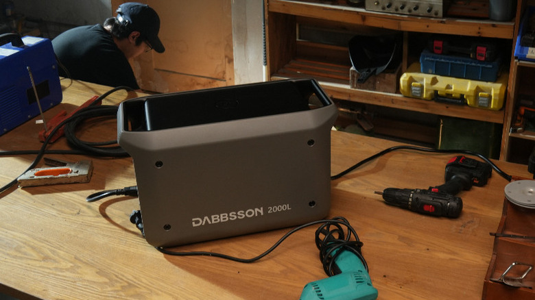A portable power station in a workshop