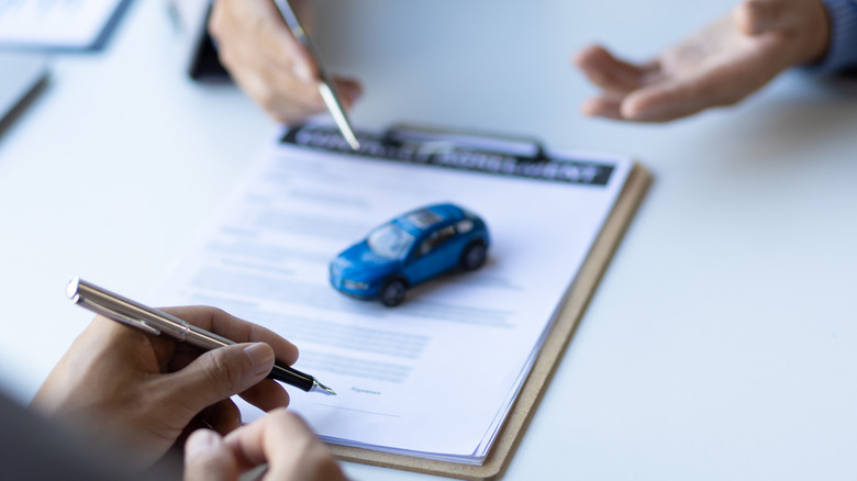 Car insurance paperwork is completed