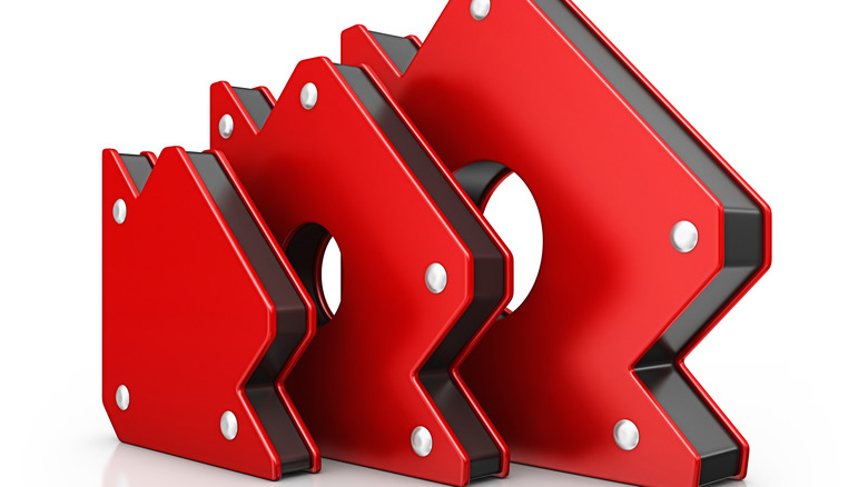 set of red welding magnets