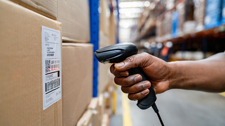 Warehouse worker scanning barcode