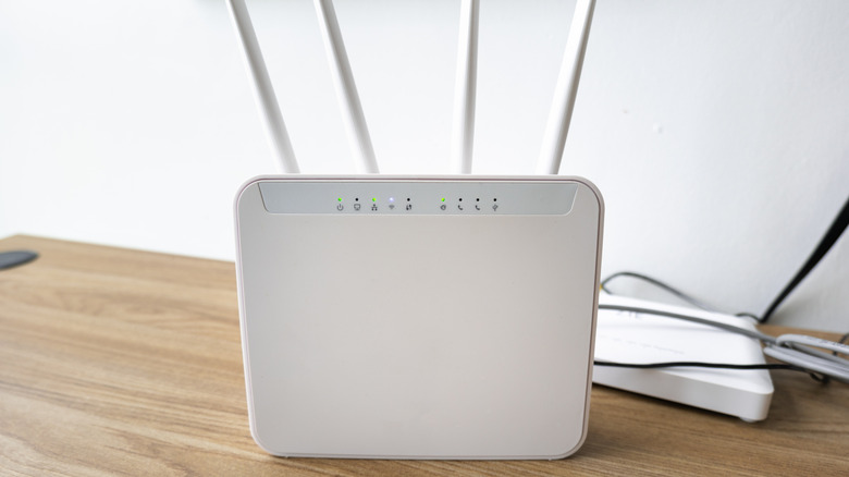 An old wi-fi router on a table.