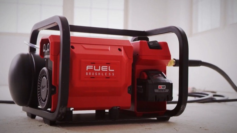 Milwaukee M18 Fuel 2-gallon Horizontal Portable Quiet Air Compressor in a white room