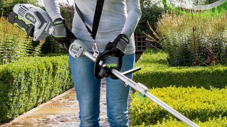 Person using the Ego Power+ Multi-Head Power System