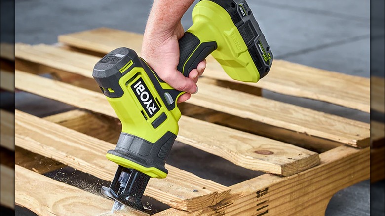 18V One+ One-Handed Reciprocating Saw in use