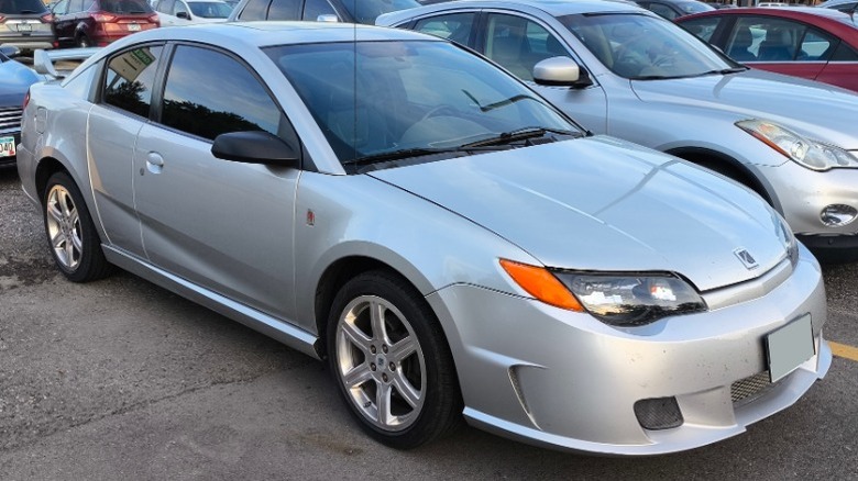 Silver Saturn Ion Red Line in a parking lot