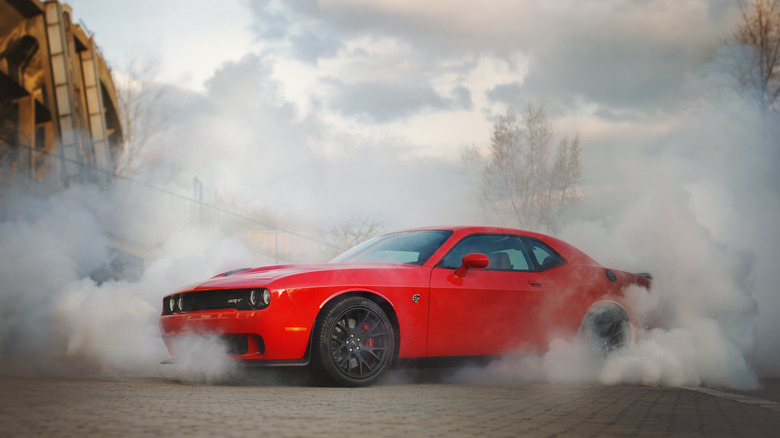 Dodge Charger Hellcat drifting smoke