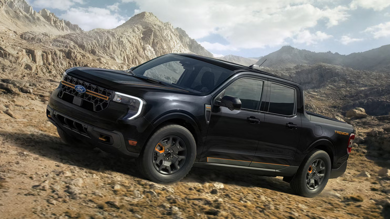 Black Ford Maverick Tremor on rugged mountain terrain