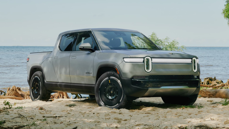 2026 Rivian R1T parked next to a water body