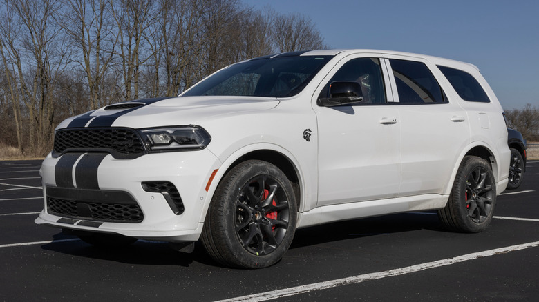 A white Dodge Durango SRT Hellcat parked.