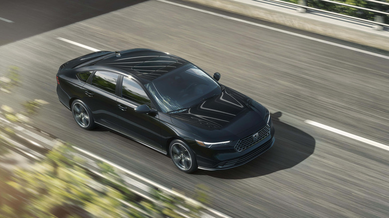 2026 Honda Accord driving on highway, aerial photo, front-right view