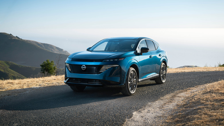 2025 Nissan Murano on a high-altitude road, front 3/4 view