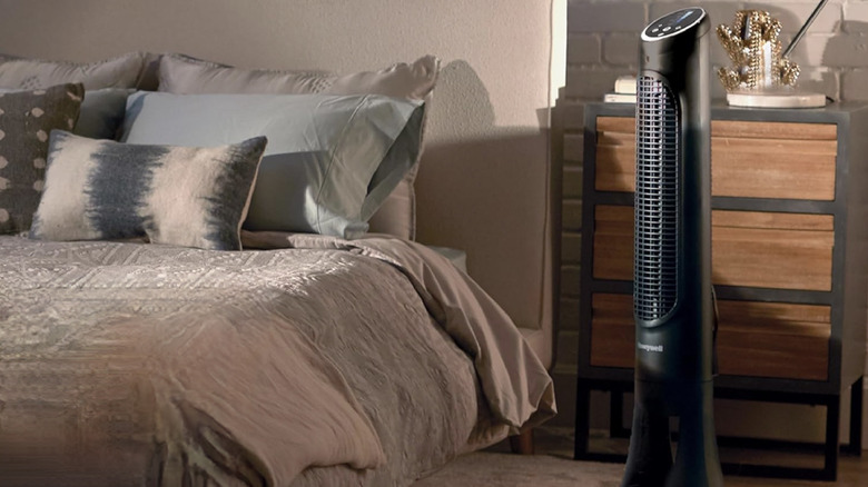 Honeywell tower fan set up in a bedroom