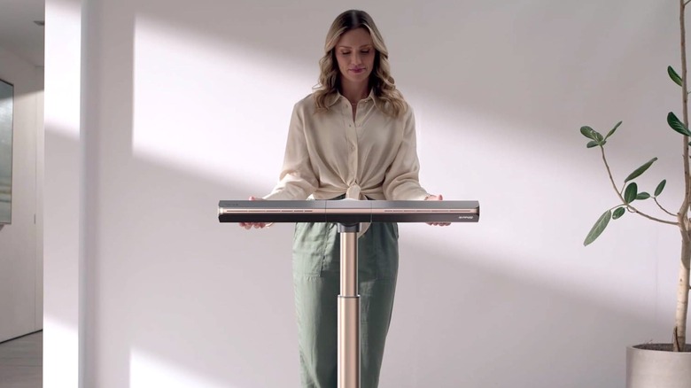 Woman setting up a Turboblade fan