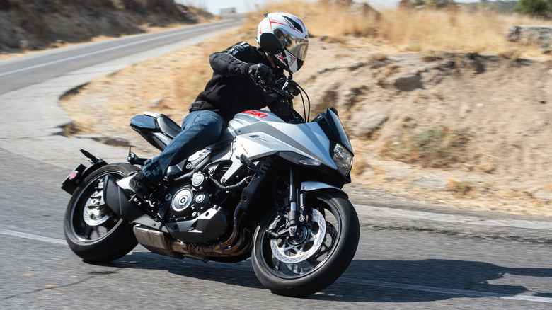 Person riding Suzuki Katana