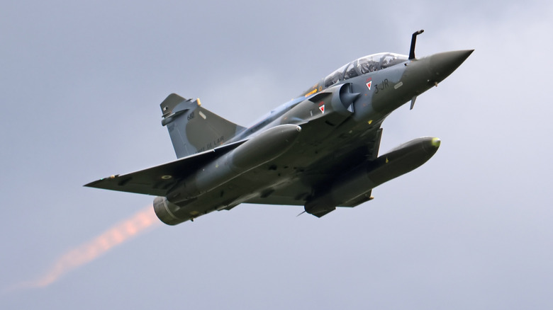 Dassault Mirage 2000 taking off with afterburners ignited.