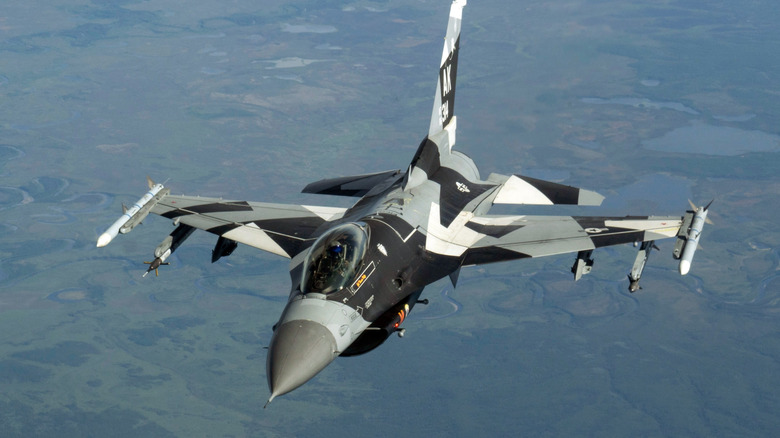F-16 Fighting Falcon maneuvering into a refueling position.