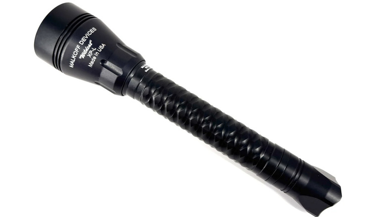 A black Malkoff Devices Wildcat flashlight