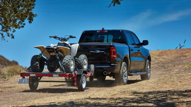 A Haul-Master foldable trailer loaded with a quad bike.