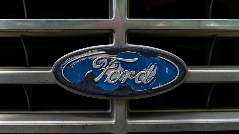 Rusted Ford logo on grill