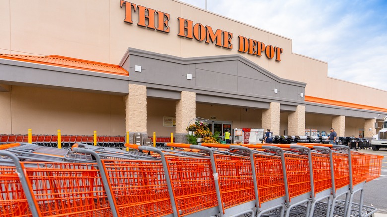 Home Depot storefront with shopping carts in a line