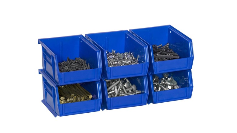 stacking storage bins with nails in it