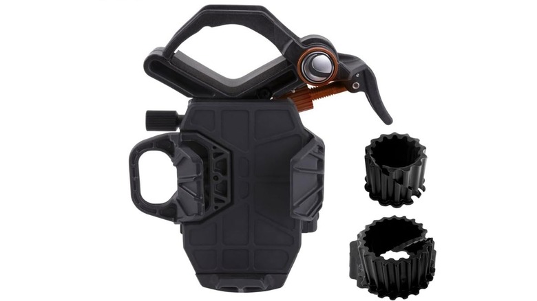Celestron NexYZ 3-Axis smartphone adapter next to two ridged adapter rings against a white background