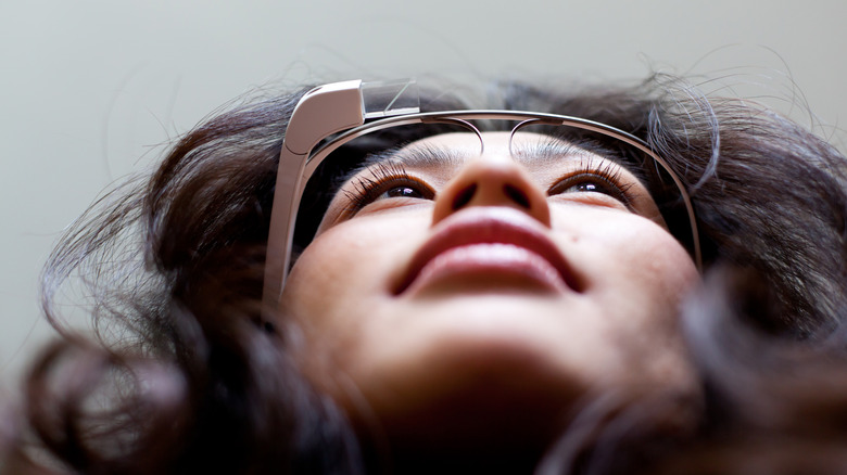 A woman wearing the Google Glass