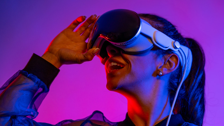 A person wearing the Apple Vision Pro headset