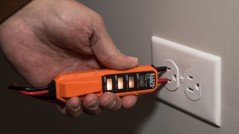 Using the Klein Tools ET45 to test for voltage.