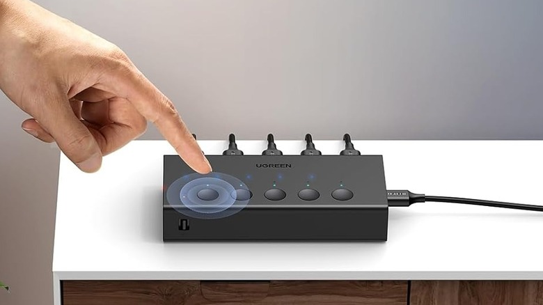 A person using an HDMI switch