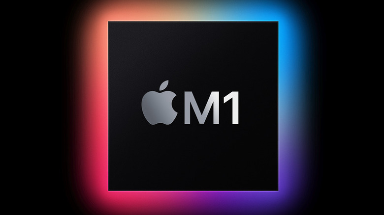 A graphic of the M1 chip glowing over a black background