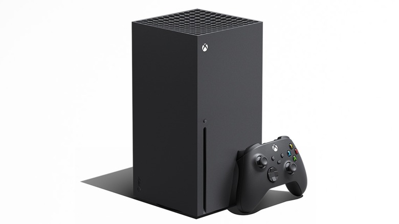 Microsoft Xbox Series X and controller against a white background
