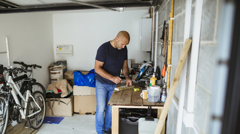 Person working in home garage workshop