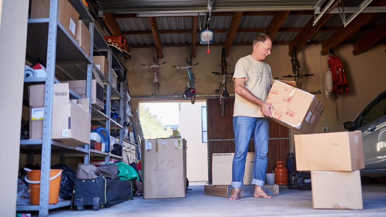 man organizing garage