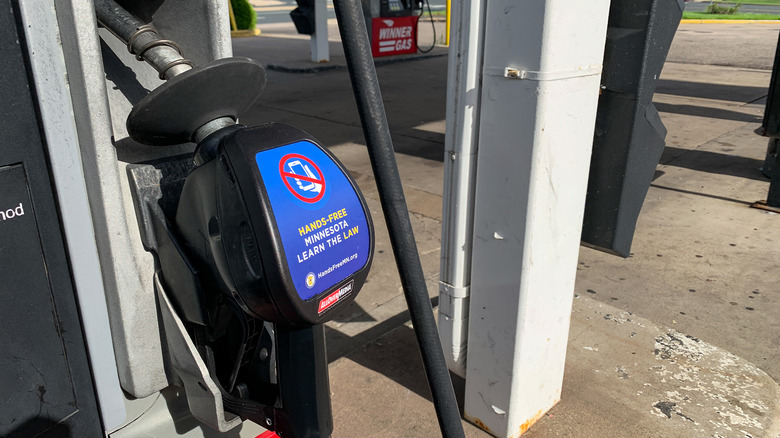 A fuel pump telling people not to use smartphones
