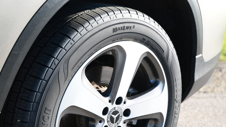Close-up of a Goodyear Assurance MaxLife2 tire on a Mercedes-Benz