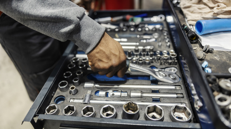 Tools being put away in a tool box