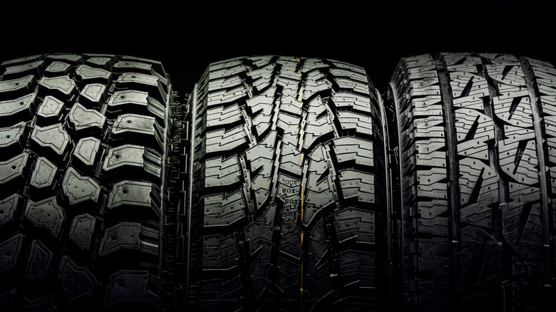 Three all-terrain tires in a row