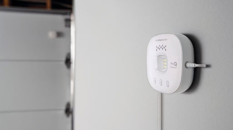 Chamberlain myQ smart garage control mounted to a wall