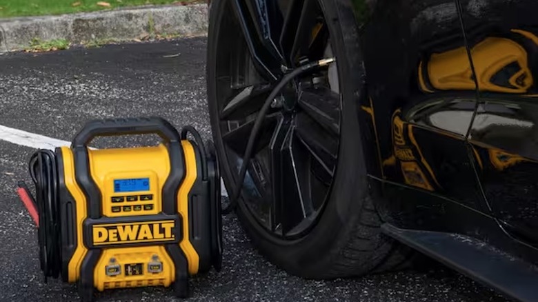 DeWalt tool inflating a car tire