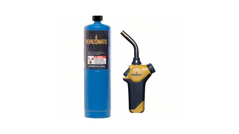A shot of a Bernzomatic Commander propane torch on a white background.
